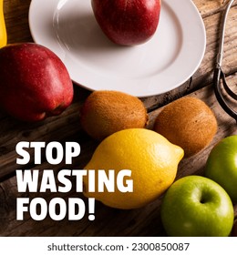 Composition of stop wasting food text over fresh fruit and white plate. Stop food waste and food wasting awareness concept digitally generated image. - Powered by Shutterstock