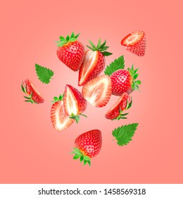 The composition of strawberries on a colored background. Cut strawberries into pieces with copy space. Fresh natural strawberry isolated. Strawberry slices flying in the air - Shutterstock ID 1458569318