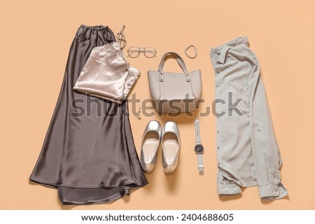 Composition with stylish female accessories, shoes and clothes on color background