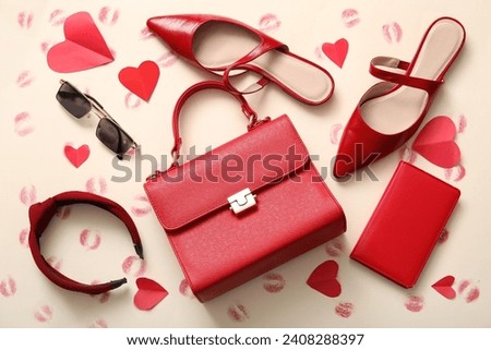 Composition with stylish female accessories, shoes and lipstick kiss marks on color background. Valentine's Day celebration