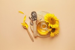 Composition With Sunflower Oil And Seeds On Color Background