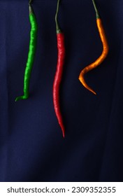 A composition of a three different color of chilli