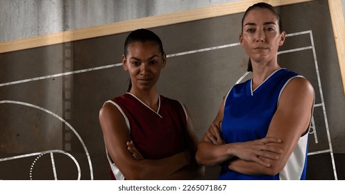 Composition of two diverse female basketball players over basketball court. sport and competition concept digitally generated image. - Powered by Shutterstock