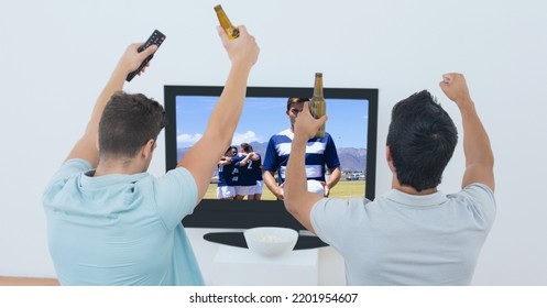 Composition Of Two Male Sports Fans Watching Rugby Match On Tv. Sport And Competition Concept Digitally Generated Image.