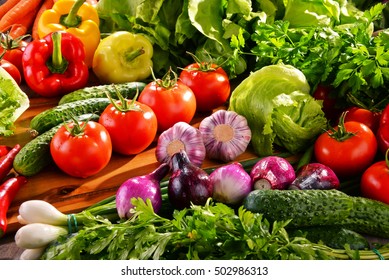 Composition with variety of fresh organic vegetables.