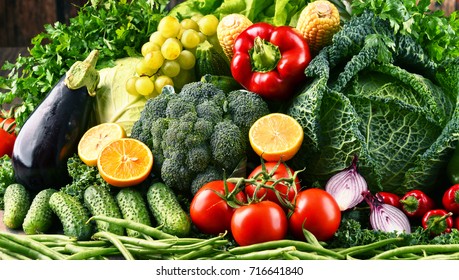 Composition with variety of raw organic vegetables and fruits. Balanced diet - Shutterstock ID 716641840
