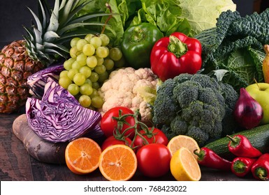 Composition with variety of raw organic vegetables and fruits. Balanced diet - Shutterstock ID 768423022