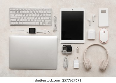 Composition with various gadgets on light background