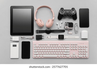 Composition with various modern devices on grey background