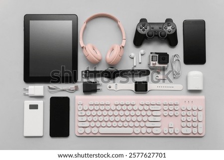 Composition with various modern devices on grey background