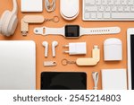 Composition with various modern gadgets on color background