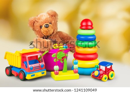 Composition of various toys on blurred background