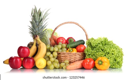 Composition with vegetables and fruits in wicker basket isolated on white - Shutterstock ID 123257446