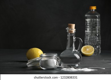 Composition With Vinegar, Lemon And Baking Soda On Table