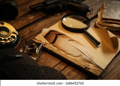 Composition with vintage detective items on wooden table, closeup