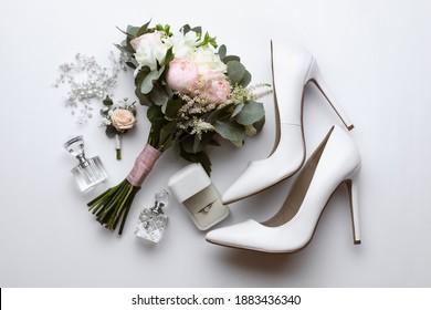 Composition with wedding high heel shoes on white background, top view - Powered by Shutterstock