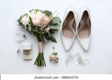 Composition with wedding high heel shoes on white background, top view - Powered by Shutterstock