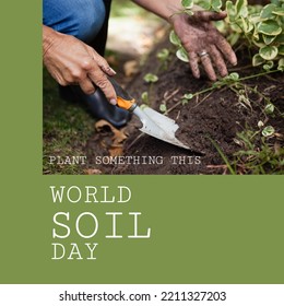 Composition of world soil day text over biracial woman's hands with spade in garden. World soil day, gardening, planting, eco living and sustainability concept. - Powered by Shutterstock