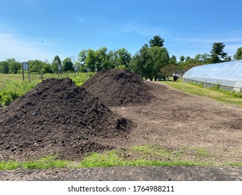 Compost piles in the farm - Shutterstock ID 1764988211