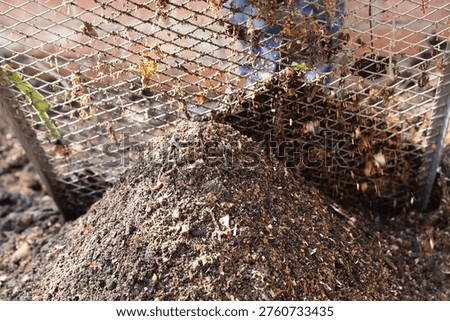 Compost soil that passes through a compost sieve for finer compost