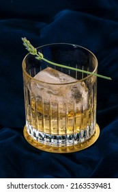 Compound Gin Or Bathtub Gin Garnished With Lavender; It Is Inspired By The Days Of America's Prohibition, Made By Steeping Grain Alcohol With Juniper Berries And Water In A Large Jar