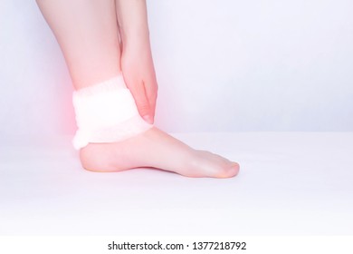 Compress And Ankle Support To Eliminate Pain, Inflammation And Dislocation Of The Ankle Joint, Close-up, Copy Space, Osteoarthritis