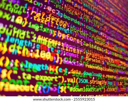 Compressed javascript code on computer screen. Sale  tagcloud. Pixelated data stream on digital interface with binary code, encryption concept, and glowing dots. Software development. Close up.