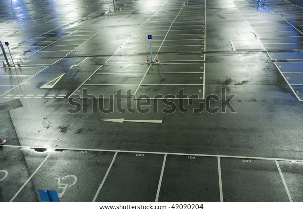 Compressed view of parked\
cars in car park