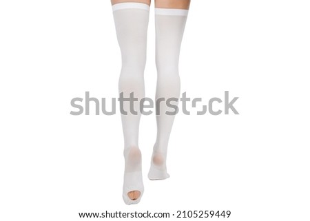 Compression Hosiery for surgery isolated on white. Medical stockings, tights for varicose veins therapy. Embolism deterrent hose or anti-embolism stockings.
