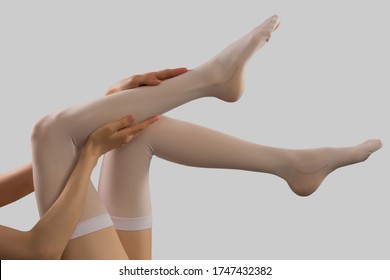 Compression Stockings In Grey Background