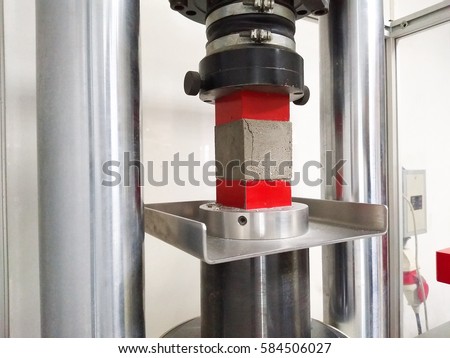Similar – Image, Stock Photo Test of cement compressive strength according to standards, properties of engineered composite materials and cement strength are tested in the physics laboratory.
