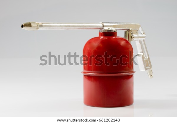 Compressor accessories, paint gun, pouring,\
crunching, blowing,\
isolated