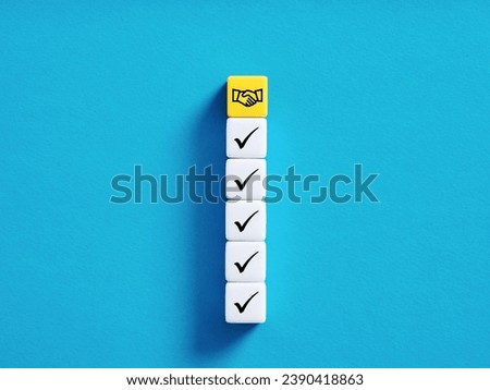Compromise and coming to a business agreement. Steps taken for a successful business deal or partnership. Colorful cubes with check mark and handshake symbols on blue background.
