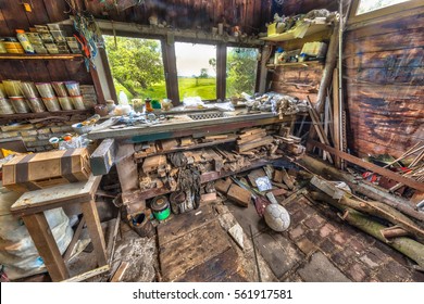 Compulsive Hoarding Very Messy Workbench In A Wooden Barn