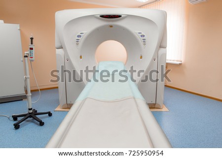 Computed tomography or computed axial tomography scan machine in hospital room. Equipment in oncology department. Nuclear Medicine. 