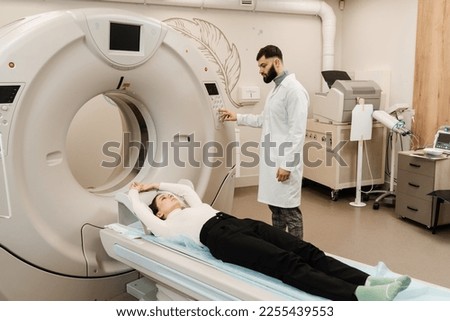 Computed tomography CT scan process for examination of spine. CT scanning of the spine examination for assess for herniated disk, tumors, extent of injuries, blood vessel malformations