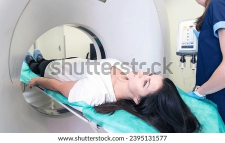 Computed tomography of the pelvis and hard tissues for women. CT scan to cure tissue diseases. Professional diagnosis of the organs of a young girl.