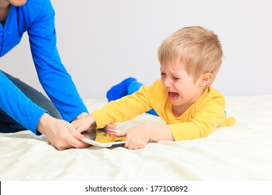 Computer Addiction, Parent Taking Out Touch Pad From Child