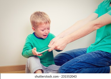 Computer Addiction, Parent Taking Out Touch Pad From Child