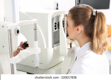 Computer Aided Visual Acuity.The Patient During An Eye Examination At The Eye Clinic 