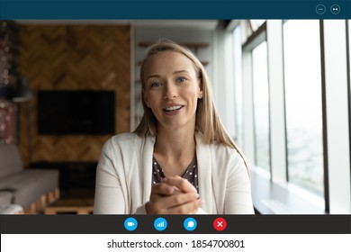 Computer application head shot display view smiling young blonde 30s woman talking looking at web camera, successful businesswoman holding online video call negotiations meeting with partners.