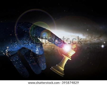 Computer artificial intelligence hand concept of check mate against a white king chess piece. AI technology brain of a robot arm supersedes human power. Copyspace area.