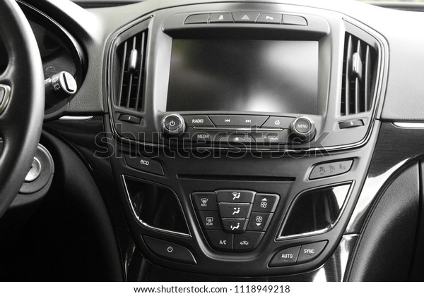 Computer of the car. Electronics.\
View of the interior of a modern car showing the\
dashboard