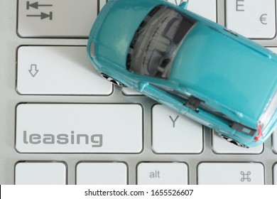 A Computer, Car And The Key For Leasing