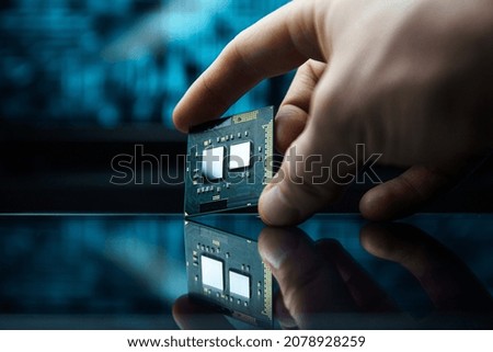 Computer chip in hands. A chipset is a set of electronic component that is integrated and flows data between the processor. Chipsets usually work with a specific family of microprocessors.