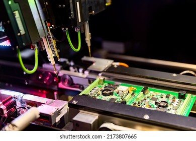 Computer circuit board assembly and robotic automatic flying test probe. Selective focus. - Shutterstock ID 2173807665