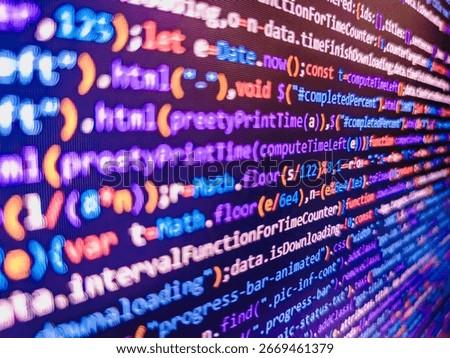 Computer code background. Colorful programming source typed on the screen of the monitor with shallow focus effect. Modern technology and futuristic concept abstract visualization of software. 