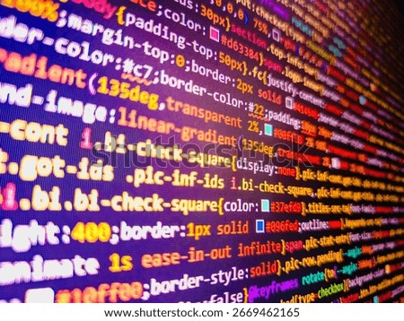 Computer code background. Colorful programming source typed on the screen of the monitor with shallow focus effect. Modern technology and futuristic concept abstract visualization of software. 