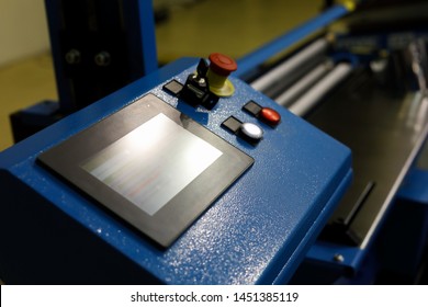 Computer controlled metal sheet bending machine. Selective focus.