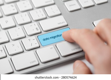 Computer Data Backup Concept - Data Migration On Keyboard.

